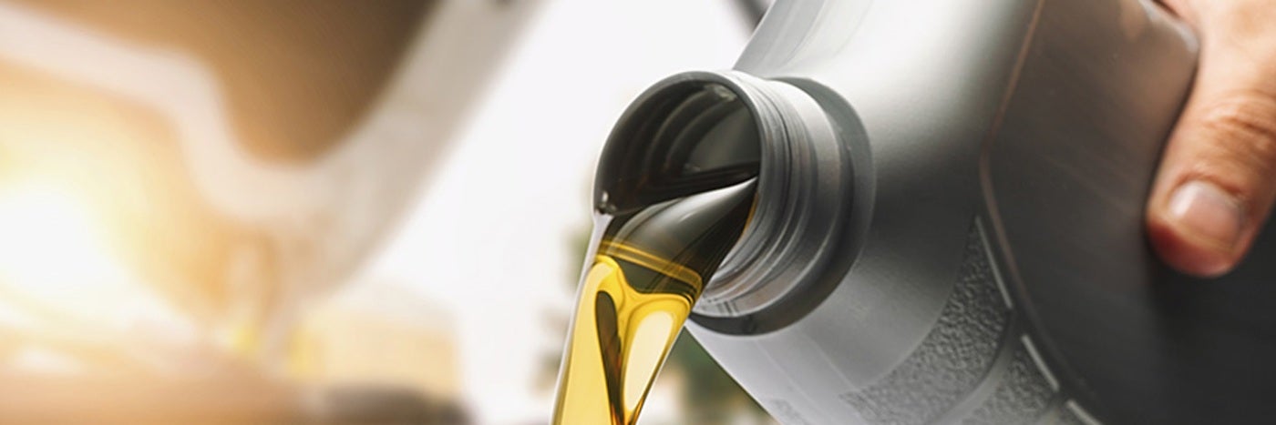 Oil being poured from a bottle